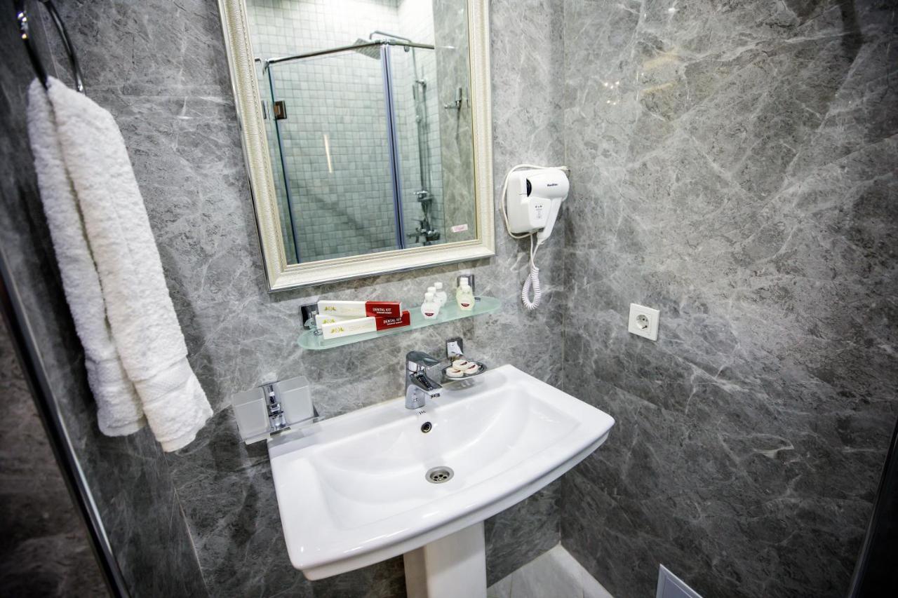 Leader Hotel Tasjkent Buitenkant foto